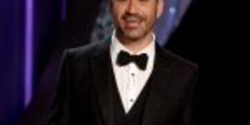(FILES) This file photo taken on September 18, 2016 shows TV host Jimmy Kimmel during the 68th Emmy Awards show at the Microsoft Theatre in downtown Los Angeles. nLate night talk show host Jimmy Kimmel will host the 89th Oscars in February, sources at the Academy of Motion Picture Arts and Sciences were reported as saying on December 5, 2016. His selection is expected to be announced imminently by Michael De Luca and Jennifer Todd, who were tapped last month to produce the ceremony, according to multiple media outlets. The Academy did not respond immediately to requests for confirmation of Kimmel's selection to front the show, which airs live on ABC on February 26. n / AFP PHOTO / Valerie MACON