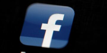 FILE - In this May 16, 2012, file photo, the Facebook logo is displayed on an iPad in Philadelphia\u002E The Washington Post reports that a federal probe into Facebook's sharing of user data with Cambridge Analytica now involves the FBI, the Securities and Exchange Commission and the Justice Department, in addition to the Federal Trade Commission\u002E Facebook confirmed to The Associated Press that it has received questions from these agencies and said it is cooperating with the probe\u002E (AP Photo/Matt Rourke, File)