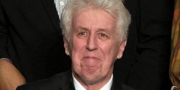 FILE - In this Dec\u002E 15, 2016, photo, CNN commentator Jeffrey Lord, appears at a rally for President-elect Donald Trump in Hershey, Pa\u002E CNN cut ties Thursday, Aug\u002E 10, 2017, with Lord, a conservative commentator, after he tweeted a Nazi salute at a critic\u002E (AP Photo/Matt Rourke, File)