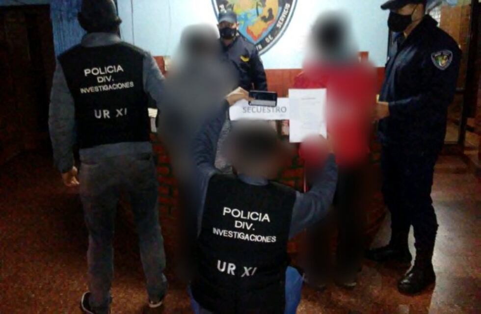 Dos detenidos y un teléfono robado recuperado en un allanamiento
