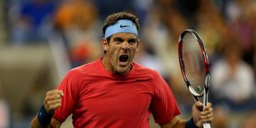 (FILES) In this file photo taken on August 28, 2013 Juan Martin Del Potro of Argentina celebrates after defeating Guillermo Garcia-Lopez of Spain in their men's singles first round match on Day Three of the 2013 US Open at USTA Billie Jean King National Tennis Center in the Flushing neighborhood of the Queens borough of New York City\u002E - Juan Martin del Potro underwent surgery on his right knee for the third time on August 26, 2020, the same which got injured in the Masters of Shanghai in 2018, his press team informed\u002E (Photo by ELSA / GETTY IMAGES NORTH AMERICA / AFP)
