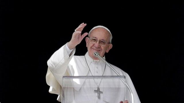 Pope Francis waves to faithful during the Angelus prayer delivered by Pope Francis in St. Peter's Square at the Vatican, Sunday, March 5, 2017. The pontiff has called on the faithful to consult the Bible with the same frequency as they might consult their
