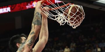 Argentina's Gabriel Deck dunks the ball during the Basketball World Cup quarter-final game between Argentina and Serbia in Dongguan on September 10, 2019\u002E (Photo by Ye Aung Thu / AFP)