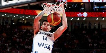 Basketball - FIBA World Cup - Final - Argentina v Spain - Wukesong Sport Arena, Beijing, China - September 15, 2019  Argentina's Gabriel Deck dunks the ball  REUTERS/Kim Kyung-Hoon