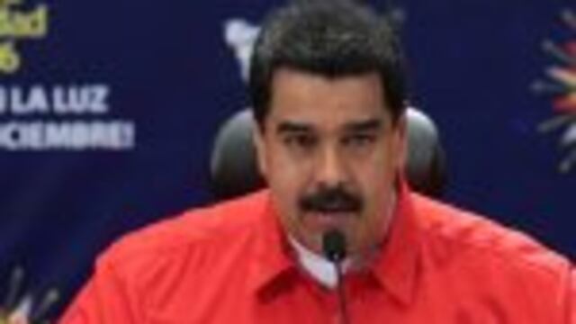 VEN001. Caracas (Venezuela), 11/12/2016.- A handout picture provided by the press office of the Miraflores presidential palace shows the President of Venezuela Nicolas Maduro speaking during an official event in Caracas, Venezuela, 11 December 2016. Venez