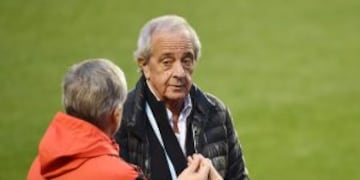 Argentina's River Plate president Rodolfo D'Onofrio (R) stands on the pitch during a training session at a sub ground of the Nagai Stadium ahead of their next match in the Club World Cup football tournament in Osaka on December 15, 2015. AFP PHOTO / KAZUH