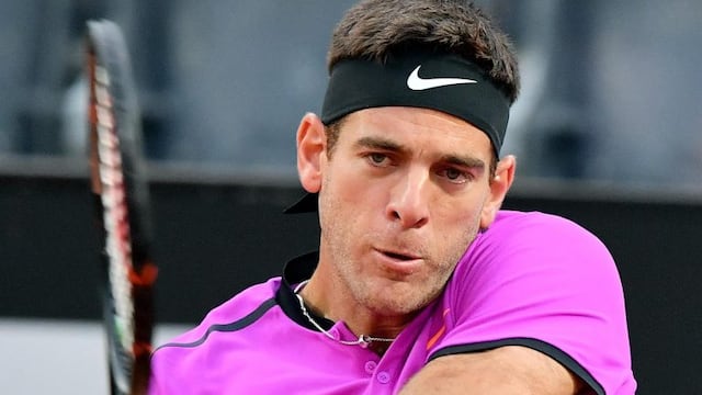 Juan Martin Del Potro, of Argentina, returns the ball to Grigor Dimitrov, of Bulgaria, during their first round match for the Italian Open tennis tournament in Rome, Monday, May 15, 2017. (Ettore Ferrari/ANSA via AP)
