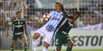 Bruno Bianchi, of Argentina's Atletico Tucuman, left, vies for the ball with Miguel Borja Hernandez, of Brazil's Palmeiras during their Copa Libertadores soccer match in Tucuman, Argentina, Wednesday, March 8, 2017\u002E (Gustavo Garello/Jam Media via AP) tucuman bruno bianchi futbol copa libertadores 2017 futbol futbolistas atletico tucuman palmeiras