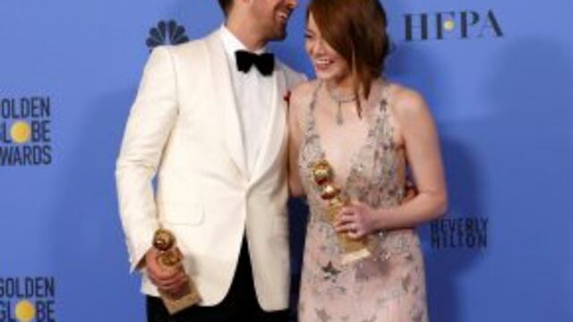 Ryan Gosling and Emma Stone pose with their awards for Best Performance by an Actor in a Motion Picture - Musical or Comedy and Best Performance by an Actress in a Motion Picture - Musical or Comedy for their roles in