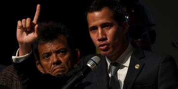 Venezuelan opposition leader and self-proclaimed acting president Juan Guaido speaks during a meeting with a group of workers of the state oil company of Venezuela (PDVSA) at the Metropolitan University in Caracas, on May 3, 2019\u002E - Venezuelan opposition leader Juan Guaido called for peaceful demonstrations at army bases, days after a military uprising in support of his bid to oust President Nicolas Maduro fizzled out\u002E (Photo by YURI CORTEZ / AFP)