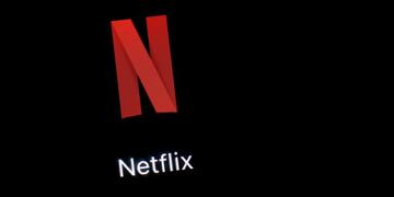FILE - This March 19, 2018, file photo shows the Netflix app on an iPad in Baltimore\u002E Netflix reports earnings Wednesday, July 17, 2019\u002E (AP Photo/Patrick Semansky, File)