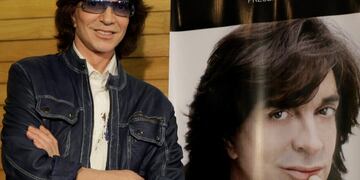 FILE - In this Nov\u002E 4, 2009, file photo, Spanish singer Camilo Sesto poses next to a poster depicting himself during a news conference in Mexico City\u002E Spanish singer and songwriter Camilo Sesto, a popular star in the 1970s and 1980s, has died of heart failure early on Sunday Sept\u002E 8, 2019\u002E He was 72\u002E Sesto, whose real name was Camilo Blanes Cortes, sold more than 100 million records worldwide over his 40-year career\u002E (AP Photo/Gregory Bull, file)