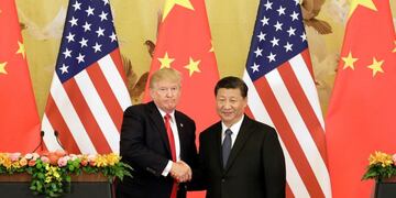 FILE: U\u002ES\u002E President Donald Trump, left, and Xi Jinping, China's president, shake hands during a news conference at the Great Hall of the People in Beijing, China, on Thursday, Nov\u002E 9, 2017\u002E Monday, January 20, 2020, marks the third anniversary of U\u002ES\u002E President Donald Trump's inauguration\u002E Our editors select the best archive images looking back over Trump’s term in office\u002E Photographer: Qilai Shen/Bloomberg