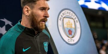 (FILES) In this file photo taken on May 25, 2012 Barcelona's coach Josep Guardiola (L) embraces Barcelona's Argentinian forward Lionel Messi (R) at the end of the Spanish King's Cup final football match between Athletic Bilbao and FC Barcelona at the Vicente Calderon stadium in Madrid\u002E - Six-time Ballon d'Or winner Lionel Messi told Barcelona he wants to leave -- on a free transfer -- in a \