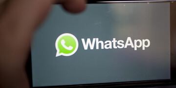 The Facebook Inc\u002E WhatsApp logo is displayed on an Apple Inc\u002E iPhone in an arranged photograph taken in Arlington, Virginia, U\u002ES\u002E on Monday, April 29, 2019\u002E Facebook paid out a $123 million fine to EU antitrust regulators for failing to provide accurate information during their review of Facebook's WhatsApp takeover\u002E Photographer: Andrew Harrer/Bloomberg
