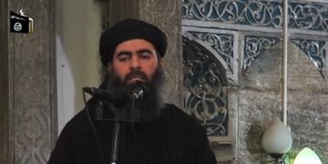 (FILES) - A file image grab taken from a propaganda video released on July 5, 2014 by al-Furqan Media allegedly shows the leader of the Islamic State (IS) jihadist group, Abu Bakr al-Baghdadi, aka Caliph Ibrahim, adressing Muslim worshippers at a mosque in the militant-held northern Iraqi city of Mosul\u002E Baghdadi, on May 14, 2015, urged Muslims to emigrate to his self-proclaimed \