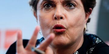 Former Brazilian president Dilma Rousseff gestures during a press conference at the International Federation for Human Rights film festival (FIDH) on March 11, 2017 in Geneva.nDilma Rousseff was ousted after the Senate controversially voted on August 31, 2016 to impeach her for illegally manipulating the national budget. / AFP PHOTO / Fabrice COFFRINI