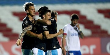 Hector Fertoli of Argentina's Racing Club, second left, celebrates scoring his side's second goal with teammates during a Copa Libertadores soccer match against Uruguay's Nacional in Montevideo, Uruguay, Wednesday, Sept\u002E 30, 2020\u002E (Mariana Greif/Pool via AP)