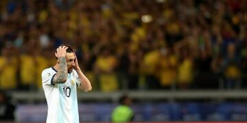 Argentina's Lionel Messi reacts during a Copa America semifinal soccer match against Brazil at the Mineirao stadium in Belo Horizonte, Brazil, Tuesday, July 2, 2019\u002E (AP Photo/Natacha Pisarenko)