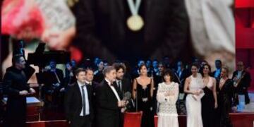 Argentinian film director Gaston Duprat (L), Argentinian film director Mariano Cohn (4L) and other crew members receive the best Latin-American film award for 'El ciudadano ilustre' (The distinguised citizen) at the 31st Goya awards ceremony in Madrid on
