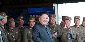 This undated picture released by North Korea's official Korean Central News Agency (KCNA) on April 26, 2017 shows North Korean leader Kim Jong-Un (C) attending the combined fire demonstration of the services of the Korean People's Army in celebration of its 85th founding anniversary at the airport of eastern front. / AFP PHOTO / KCNA VIA KNS / STR / South Korea OUT / REPUBLIC OF KOREA OUT   ---EDITORS NOTE--- RESTRICTED TO EDITORIAL USE - MANDATORY CREDIT