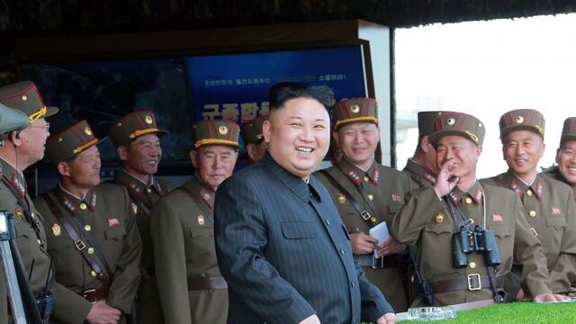 This undated picture released by North Korea's official Korean Central News Agency (KCNA) on April 26, 2017 shows North Korean leader Kim Jong-Un (C) attending the combined fire demonstration of the services of the Korean People's Army in celebration of its 85th founding anniversary at the airport of eastern front. / AFP PHOTO / KCNA VIA KNS / STR / South Korea OUT / REPUBLIC OF KOREA OUT   ---EDITORS NOTE--- RESTRICTED TO EDITORIAL USE - MANDATORY CREDIT