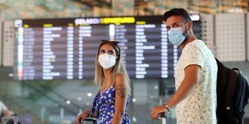 Tourists wearing face masks wait at Split International Airport in Split, Croatia, on August 21, 2020\u002E - As United Kingdom removed Croatia from the list of \
