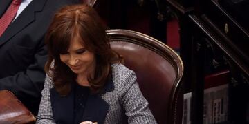 Former Argentine President and senator Cristina Fernandez de Kirchner is greeted by former Argentine President and senator Adolfo Rodriguez Saa during a session at the Senate in Buenos Aires, Argentina August 22, 2018\u002E REUTERS/Marcos Brindicci