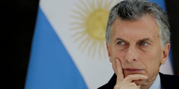 FILE - In this March 6, 2018, Argentina's President Mauricio Macri attends a luncheon at the government house Casa Rosada, in Buenos Aires, Argentina\u002E Macri faces his last year of government in Argentina with a damaged image and the economy plunged into a deep recession\u002E Even so the conservative president will seek re-election in 2019\u002E (AP Photo/Natacha Pisarenko, File)