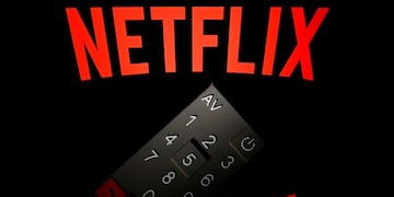 (FILES)This illustration picture taken on April 21, 2018 in Paris shows the logo of the Netflix entertainment company, displayed on a tablet screen with a remote control in front of it\u002E - Netflix unveiled plans January 15, 2019 to boost prices for US subscribers, a move that helped lift shares of the streaming television giant which now faces an array of new competitors\u002EThe California-based company, which has nearly half of its 130 million paid members in the US, will raise the price of its most popular streaming plan with high-definition video by 18 percent to $12\u002E99 per month\u002E (Photo by Lionel BONAVENTURE / AFP)