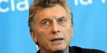 This handout picture released by Telam shows Argentine President Mauricio Macri delivering a speech at