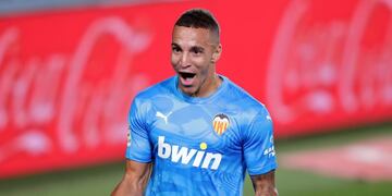 Valencia's Rodrigo Moreno celebrates after scoring his side's opening goal during the Spanish La Liga soccer match between Real Madrid and Valencia at Alfredo di Stefano stadium in Madrid, Spain, Thursday, June 18, 2020\u002E (AP Photo/Manu Fernandez)