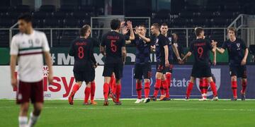 ARLINGTON, TX - MARCH 27: Croatia celebrates a goal by Ivan Rakitic of Croatia on a penalty kick in the second half of an international friendly match agaisnt Mexico at AT&T Stadium on March 27, 2018 in Arlington, Texas\u002E   Richard Rodriguez/Getty Images/AFP\n== FOR NEWSPAPERS, INTERNET, TELCOS & TELEVISION USE ONLY ==