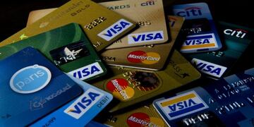 View of credit cards issued in Chile, in Santiago on May 15, 2013. In Chile, a country with high rates of consumption and retail industry that has expanded throughout Latin America, the consumer voice is heard louder in asserting their rights. AFP PHOTO/