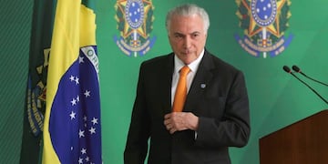 Handout picture released by Agencia Brasil showing Brazilian President Michel Temer after he announced Brazil is sending troops to reinforce security on the border with Venezuela, at Planalto Palace in Brasilia on August 28, 2018\u002E - Temer signed a decree to send the army to \