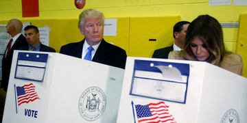 Republican presidential nominee Donald Trump and his wife Melania Trump vote at PS 59 in New York, New York, U.S. November 8, 2016. REUTERS/Carlo Allegri