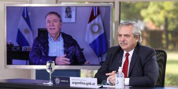 Alberto Fernández y Juan Schiaretti volverán a mantener una reunión virtual para avanzar en la contención de la segunda ola de coronavirus. (archivo)