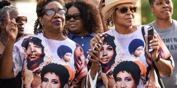 Rochelle Hampton, left, of Warren, Mich\u002E, and Imogen King-Dugan, of Farmington Hills, Mich, dance along to \