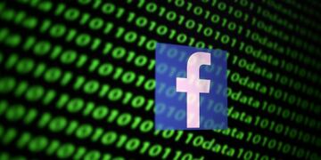 The Facebook logo and binary cyber codes are seen in this illustration taken November 26, 2019\u002E REUTERS/Dado Ruvic/Illustration