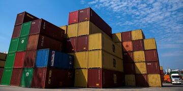 In this Sept\u002E 19, 2019 photo, stacked containers stand in the Port of Montevideo, Uruguay\u002E In the port of Montevideo, the customs terminal has a single scanner that is operated by officials who only work during office hours, never at night\u002E Additionally, the machine is only used to check imports\u002E (AP Photo/Matilde Campodonico)