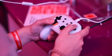 A visitor plays the cloud-gaming based \