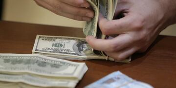 Dólar. Hasta ahora, la crisis es una gran negocio para el sector financiero. (AP)