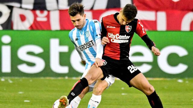 Ramiro Sordo y Facundo Mura disputan la pelota