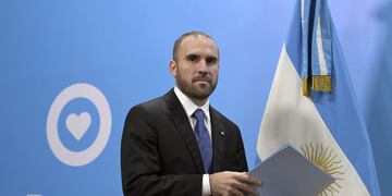 Argentina’s Economy Minister Martin Guzman arrives for a press conference at Casa Rosada announcing measures during the outbreak of the new Coronavirus, COVID-19, in Buenos Aires, Argentina on March 17, 2020. / AFP / JUAN MABROMATA