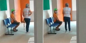 La imagen de la mujer que sostiene atado a su pareja, aguardando para que él sea vacunado contra el coronavirus.