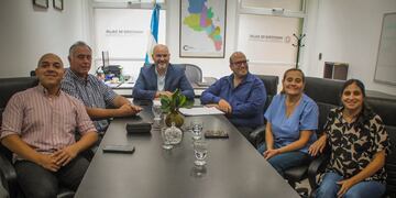 Reunión de acuerdo arancelario.