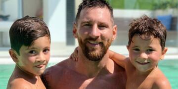 Thiago, Mateo y Lionel Messi