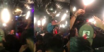 Prenden bengalas dentro de una vivienda, en el marco de una fiesta.