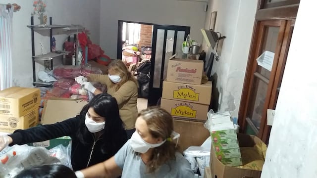 Voluntarios de Cáritas y grupo campamento de la Ciudad de Pérez ayudando a los más necesitados