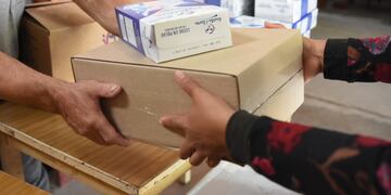 Entrega de ayuda alimentaria en Rafaela